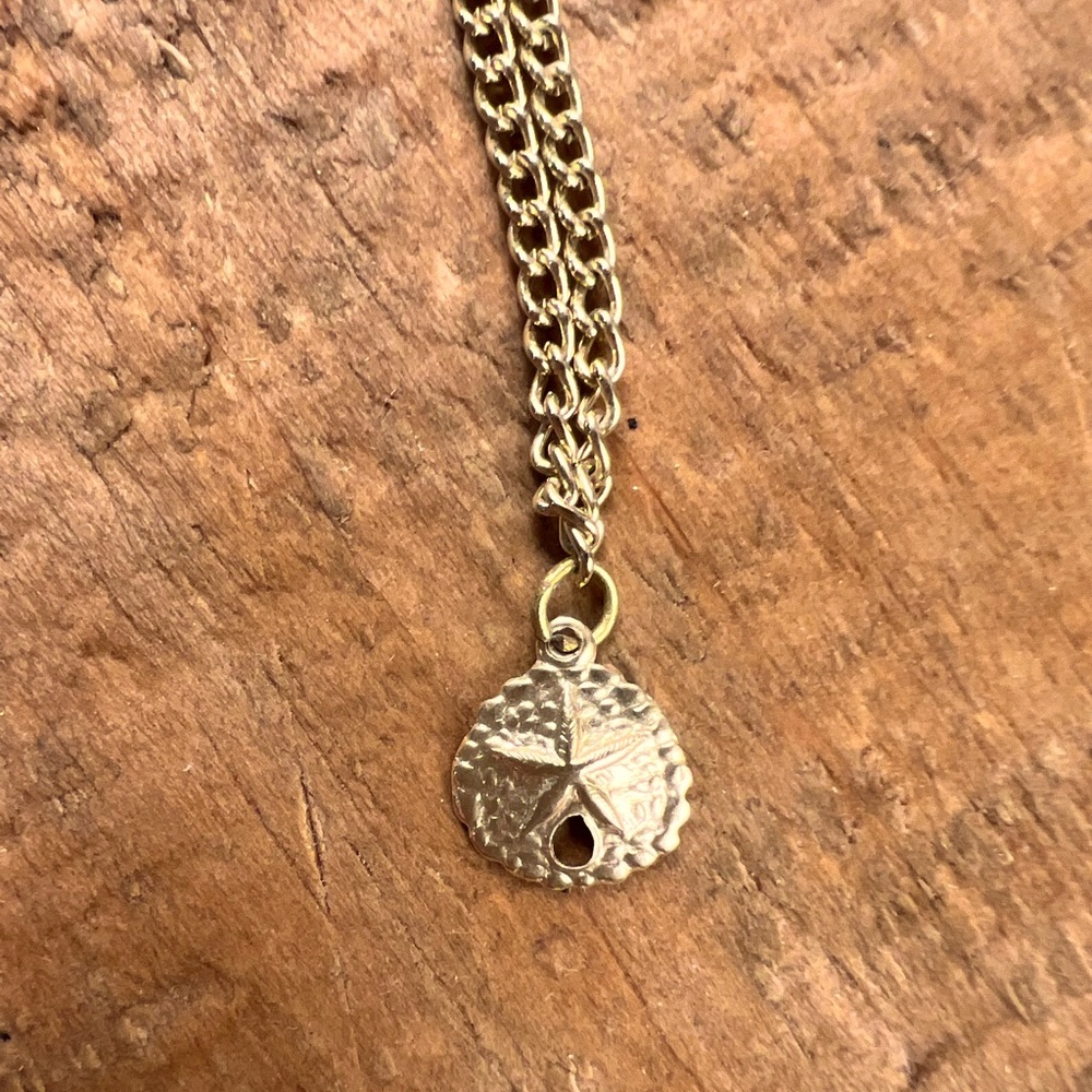 Sand dollar charm necklace